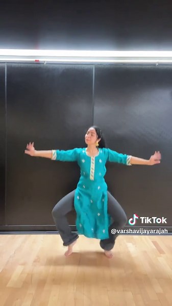 Energetic Tamil Girl Performs Traditional Bharatanatyam Dance