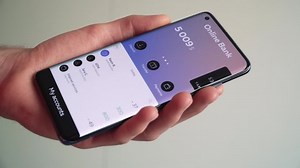 Checking bank accounts balance using the banking app on a smartphone. Internet finance, modern online bank services for smart payments, accounting, savings, and investments.