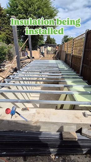 Insulation is being installed on the pool cover deck. | Simon Fielding