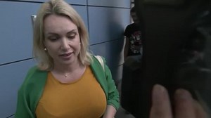 Russian TV worker arrives in court after protest