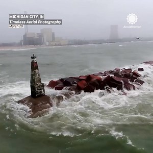 55K views · 1.6K reactions | Braving 30+ MPH winds, this stunning drone video captures waves slamming over the break wall in Michigan City.  | AccuWeather | Facebook