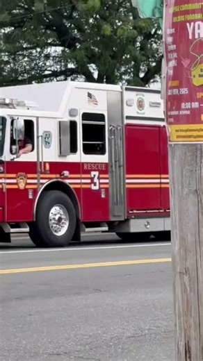 Bethpage Fire Department Rescue 3 responding to a MVA with a spill