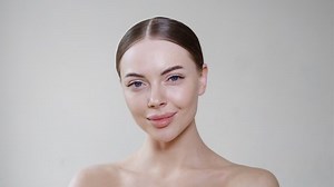 Beauty woman face healthy skin natural clean fresh make up. Beautiful female young model face healthy skin close up smiling lips smile