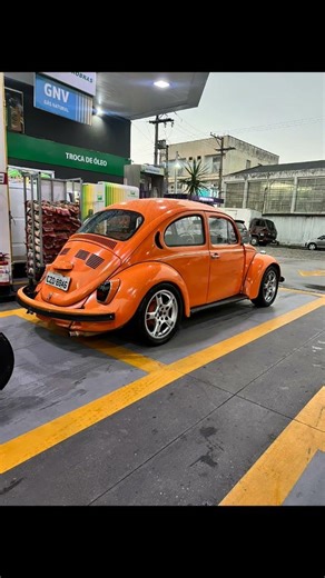 Fusca laranja fico top