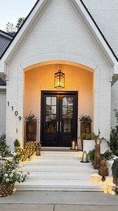 We’re ready to hop into spring 🐰 @Mati_espy_home created a whimsical front door using our Lit Rattan Easter collection, glowing candlelight, and faux botanicals for a look that’s just as eggs-ceptional by day as it is by night! Recreate the look: https://bit.ly/3FweOE4 #mypotterybarn | Pottery Barn