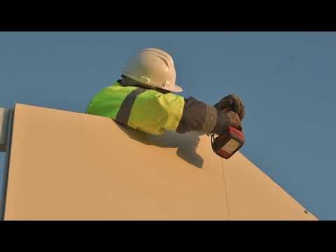 Montage d'un garage isolé et sans entretien de plus de 20 m² avec charpente métallique