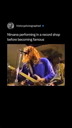 Nirvana performed an intimate, free in-store concert at Rhino Records in Westwood, Los Angeles, on June 23, 1989, shortly after the release of their debut album, Bleach. This event was one of their early, raw performances captured on video, showcasing the band before the immense global fame brought by Nevermind. | History In Pictures