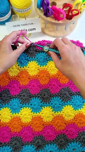 Ever see the crochet Catherine's Wheel stitch pattern before? It's quite colorful and comprised of single crochet and double crochet stitches that form circles in the work. #reels #crochet #knitting #embroidery #artsy #colorful #yarn #stitch #pattern #naztazia | Naztazia
