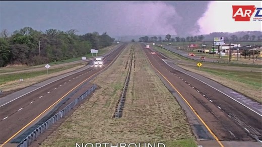 Funnel cloud illuminated by lightning in Arkansas