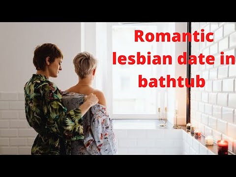 Romantic lesbian date in bathtub