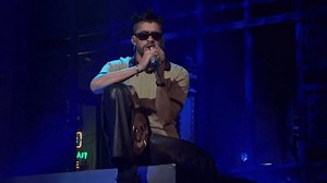 Bad Bunny performs with the 24/7 title on Saturday Night Live