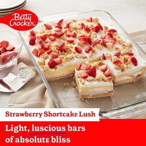 Featuring a cookie crust, strawberry cream cheese and vanilla pudding, this 4-layer Strawberry Shortcake Lush stands tall! | Betty Crocker