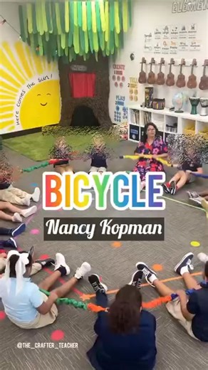 20K views · 170 reactions | Love seeing educators like Lena Leon - The Crafter Teacher using my songs in their work! This is "Bicycle", from "The Seasons" using the stretchy band from Bear Paw Creek. You can get your own stretchy band from them using my discount code NANCY10 on their website at checkout. (It's an affiliate link, which means I get a small percentage of the sale at no extra cost to you) | Children's Music with Nancy Kopman | Facebook