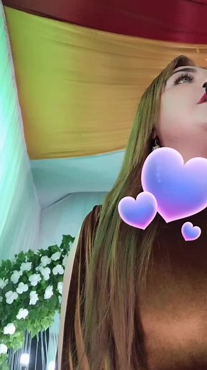 Artistic Scene with Floral Elements and Draped Fabric