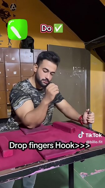 Mastering the Dropped Hook Technique in Armwrestling