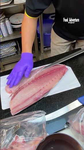 Sushi chef fine trims hamachi for perfect sushi prep #hamachi #sushichef #knifeskills #foodreels
