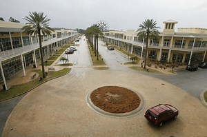 The bank-owned Wharf in Orange Beach now privately owned