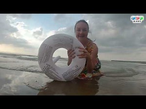 Inflatable swan for playing in the sea.