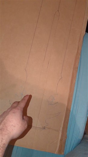 I just need to cut out 4 of these sword shapes and hot glue them together