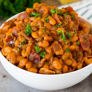 5.5K views · 1K reactions | RECIPE: https://www.dinneratthezoo.com/cowboy-beans/ This cowboy beans recipe is made with ground beef and bacon, all baked together in a sweet and savory sauce. | Dinner at the Zoo | Facebook