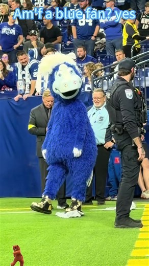 Cheering for the Blue Sea Creature Mascot!