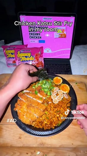 #MaruchanPartner Chicken Katsu Stir Fry in my room using @Maruchan Saucy Noods, now available on Amazon! 🥢🍜 — This is my new favorite late night craving, you can customize it so many ways. Link to the noodles in my bio! 🤤 Ingredients: • Maruchan Saucy Noods Spicy Creamy Chicken x2 • Chicken breast • Egg, Flour, Panko • Soy sauce • Mayo • Eggs • Salt & Pepper • Green onion • Fish cake • Nori • Cooking oil #SaucyNoods #getsaucy #Maruchanmoments #stirfry