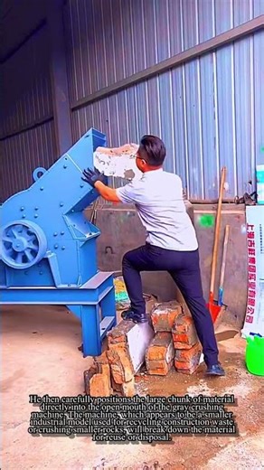 Manually Feeding Demolition Debris into a Stone Crusher