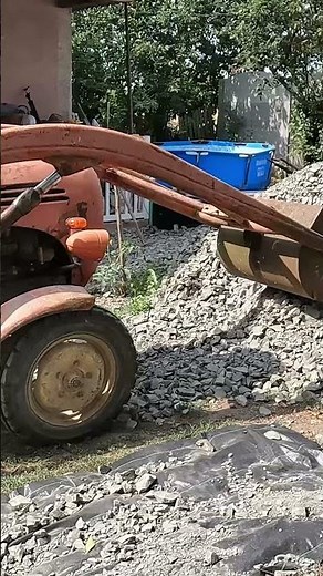 Making a stone driveway - Crafty Lab Homestead Spreading Gravel With Tractor