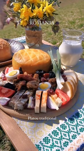 Ever felt a rumble in your stomach? Let’s talk about a Romanian feast that stops you right in your tracks—the traditional platter. It’s a culinary journey not just through flavors, but through Romania’s rich, agrarian heritage. Picture a wooden board, groaning under the weight of toba (a seasoned pork jelly), slanina (cured pork fat), jumari (crispy pork rinds), carnati (smoked sausages), cheeses like cascaval and branza, and a vibrant array of tomatoes, red and green onions, and rustic, homemad