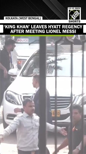 Actor Shah Rukh Khan leaves the Hyatt Regency hotel after meeting Lionel Messi