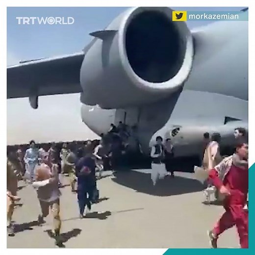 Afghans cling on to US Air Force plane