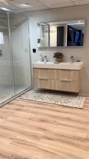Our showroom is full of stunning bathroom displays to spark your next design idea! From modern minimalism to timeless elegance — we’ve got something for every style. Pop in and browse — and don’t forget, we’re open late every Thursday for your convenience! | Aristocraft Kitchens, Bedrooms & Bathrooms