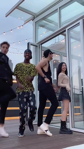 Dancing on the Rooftop: Energetic Group Dance Routine