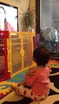 Noe doing a Sprout stretch with Nina on Sprout's Goodnight