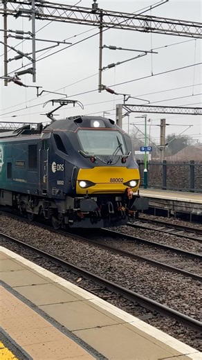 DRS Class 88 (88002 ‘Prometheus’) Hauling Tesco Containers Through Northampton