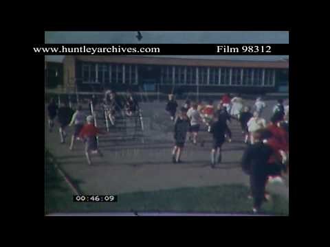 1960's British schoolchildren in playground. Archive film 98312