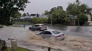 Severe thunderstorms sweep over Auckland region, causing flooding and damage to property