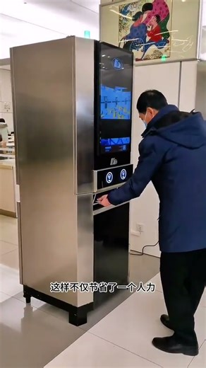 Fully Automatic Meal-Serving Machine Demonstrated in Modern Canteen