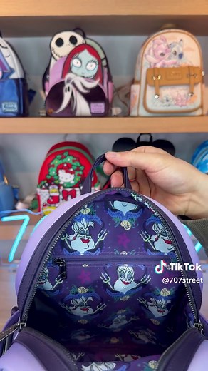 Explore the Loungefly Disney Villains Ursula Mini Backpack