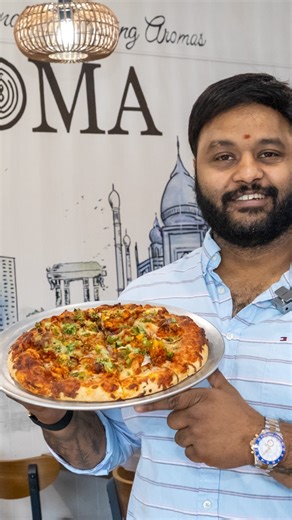 🍕🍲BUTTER CHICKEN PIZZA, ANYONE?🍽️🧋 Soma Bistro and Cafe (@soma__bistro) opened its doors in North Charlotte this spring. The new eatery, with a name that stands for “serving originals, merging aromas,” is designed to pull “inspiration from the streets of Hyderabad, the markets of Delhi, and the kitchens of Mumbai.” “We are inspired by fusion food. That’s why we call ourselves a fusion restaurant,” Shiva Reddy told CharlotteFive. “We do still have authentic Indian food coming from north, sout