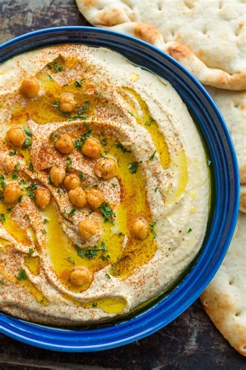 A simple, delicious homemade hummus recipe — smooth, silky, and full of flavor. Recipe: https://natashaskitchen.com/hummus-recipe/ | NatashasKitchen.com