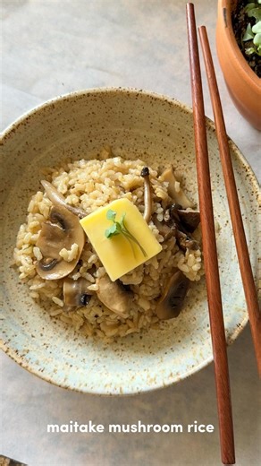 Christy on Instagram: "maitake rice 🍄 me and my $5 bag of maitake bits against the world. i used the mushroom rice recipe on my blog (just subbed for all maitake) this recipe is my take on kinoko gohan, a japanese mixed rice dish that celebrates the earthy depth of seasonal mushrooms. the boy made this for me early on in our relationship and i loved how honey and flavorful it is! — it’s traditionally cooked in a donabe along with dashi, soy sauce, sake, and mirin. for the base i used my rice mi