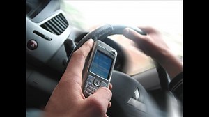 Illinois drivers banned from using hand-held phones