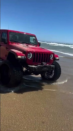 jeep Rubicon modified alloy wheels sea beach