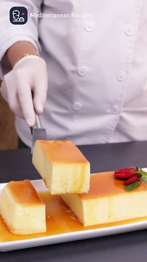 Discover the magic of effortless dessert mastery with our surefire cream caramel recipe. ✨ Create sweet perfection with ease and treat yourself and your loved ones to a delightful experience! 🍮😋 The caramel layer: 1 cup of sugar For the cream layer: 2 cups of room temperature water 2 cups of powdered milk 1/2 cup of sugar 3 room temperature eggs 1 teaspoon of vanilla 1 teaspoon of white vinegar Instructions: In a non-stick pan, melt the sugar until it turns golden caramel. Pour it into a Pyrex