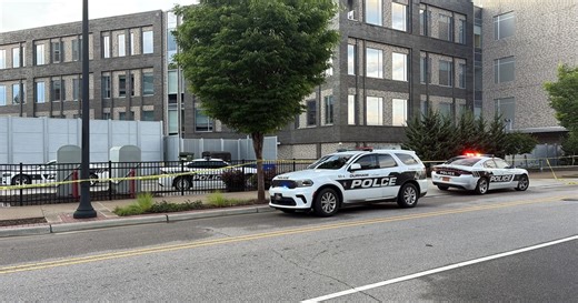 Murder suspect killed at Durham police headquarters after taking officer's gun, police say