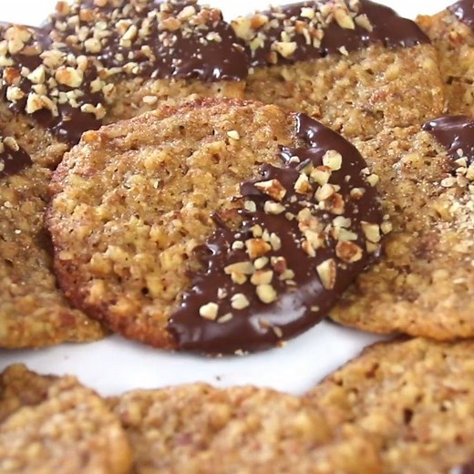 17K views · 33 reactions | These lace cookies are amazing on their own but dipped in chocolate? Insanely delicious!! FULL recipe here: https://www.melissassouthernstylekitchen.com/chocolate-dipped-pecan-lace-cookies/ | Recipe Central | Facebook