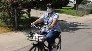 24K views · 30 reactions | The pandemic didn't stop this school librarian from getting books to families and children! | Localish | Facebook