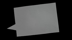 Animation of cut out paper in bubble speech shape. Stop motion for creative videos overlay. Bubble text animation in retro comic style