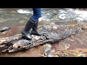 Wellies in a stream